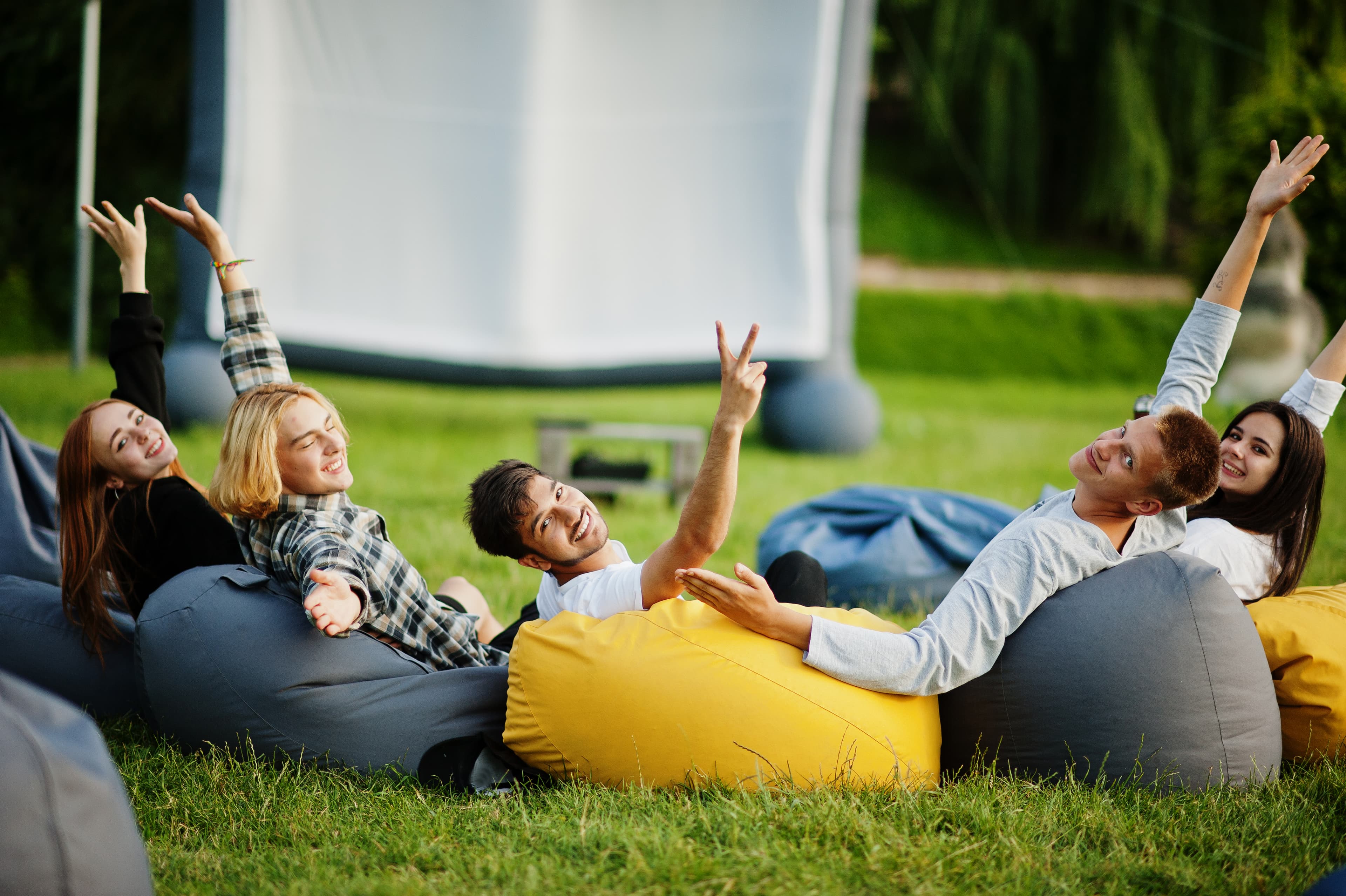 A group enjoying an open-air cinema evening